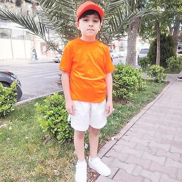 Комплекты одежды: Rengli T-shirt 👕 rəngli kepka 
rəngli futbolka 
3-14 yaş — 5