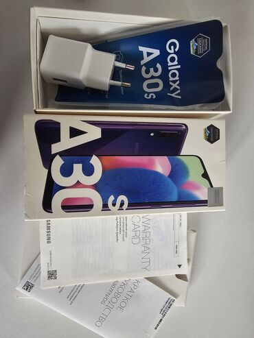 кабура: Samsung Galaxy A30s, 32 GB, rəng - Bənövşəyi, Sensor, Barmaq izi, Simsiz şarj