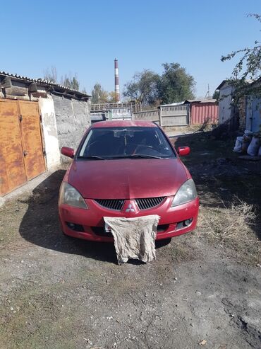 машина k5: Mitsubishi Lancer: 2003 г., 1.6 л, Механика, Бензин, Универсал