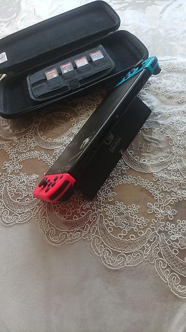 nintendo switch az: Satılır Nintendo Switch konsol set: Nintendo Switch Konsol + 4 Oyun + — 3