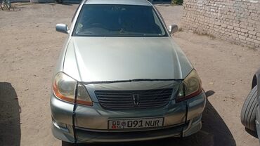 шины на lx470: Элегантный седан Toyota Mark II светло-серебристого цвета. Автомобиль