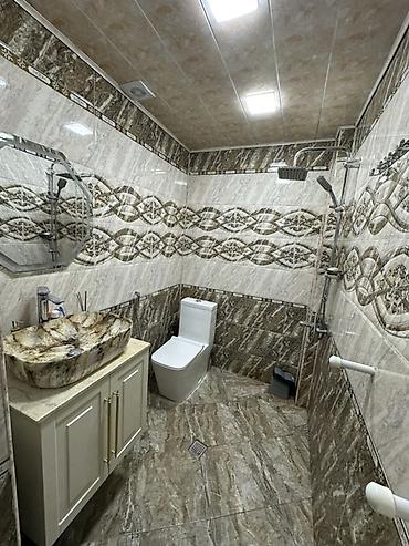 Yeni tikili: Təsvir: - Zövqlə dizayn olunmuş mənzil. Geniş dəhlizdən iki otağa və — 2