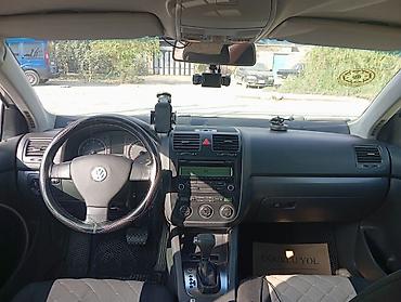 suru: Volkswagen Jetta: 1.6 l | 2008 il Sedan — 6