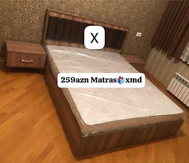 tunbucka: Yataq dəsti – ikinəfərlik çarpayı və 2 ədəd tumba. - Material: ağac — 1