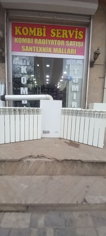 Kombilər: 1 ədəd kombi 28 kv italiya istesalı ferolli 3 ədəd radiator 26 seksiya