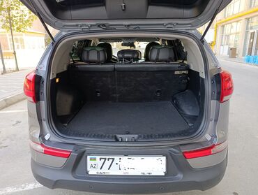 аренда авто с последующим выкупом бишкек: Boz rəngli Kia Sportage avtomobili. Geniş baqaj hissəsi gündəlik