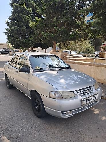 ətcəkən maşın hissələri: Kia avella sedan - Gümüşü rəng, 4 qapı - Nömrə: 10-FA-781 (AZ) - — 2