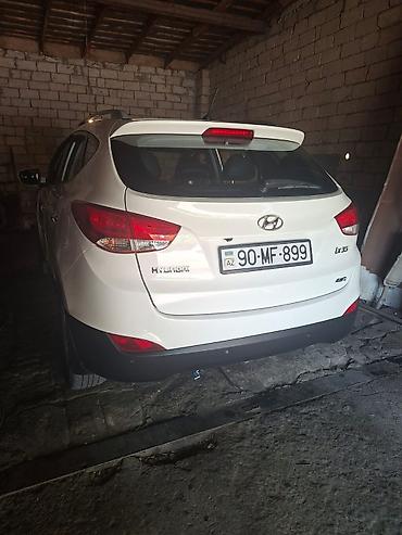 hyundai ıx35: Hyundai ix35, ağ rəng, 4WD (tam ötürücülü) krossover. Xüsusiyyətlər — 6