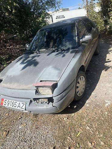 Mazda: Mazda 323: 1990 г., 1.6 л, Механика, Хэтчбэк — 7