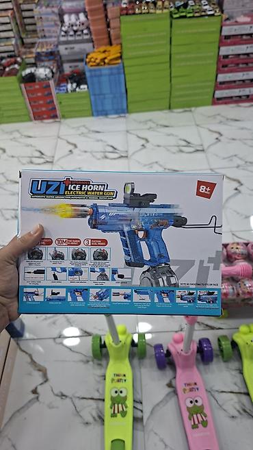 inkişaf etdirici oyuncaqlar: ● Bu, "Uzi Ice Horn" modeli olan elektrikli su tapançasıdır ● Tapança — 1