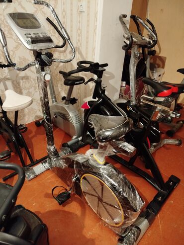 Elliptik trenajorlar: Məhsul: Stasionar velosipedlər (spinning/fitnes üçün) Təsvir: - Ev və