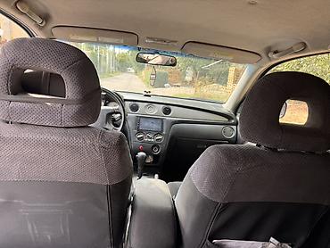 byd e2 2024: Mitsubishi Outlander: 2003 г., 2.4 л, Автомат, Бензин, Кроссовер — 5