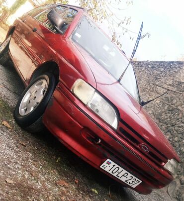 təkər satsi: Ford Escort: 1.8 l | 1992 il 176453 km Universal