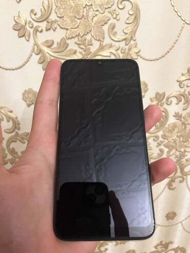 Xiaomi: Xiaomi Redmi 7, 64 GB, rəng - Qara, 
 Barmaq izi, İki sim kartlı
