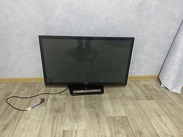 LG televizor. Qara çərçivəli, klassik dizayna malik modeldir. Şəkildə lalafo.az -da LG televizor. Qara çərçivəli, klassik dizayna malik modeldir. Şəkildə