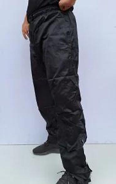 Ostali Kompleti, kombinezoni: Dvodelno kišno odelo u crno-crvenoj kombinaciji, dizajnirano za — 27