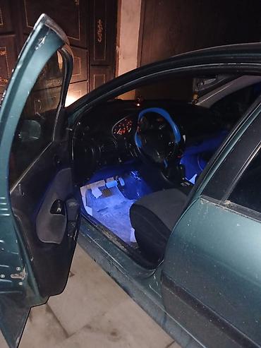maqnitola az: Peugeot 206: 1.4 l | 2003 il 342000 km Hetçbek — 2