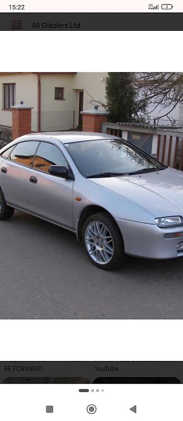 Mazda 323: 1996 г., 1.5 л, Механика, Бензин, Лифтбек — 1