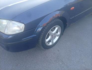 222 кузов: Mazda Familia: 2000 г., 1.5 л, Механика, Бензин, Седан — 4