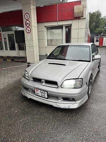 громкий выхлоп: Subaru Legacy: 1999 г., 2 л, Автомат — 6