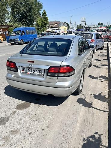Транспорт: Mazda 626: 1999 г., 1.8 л, Бензин, Седан — 2