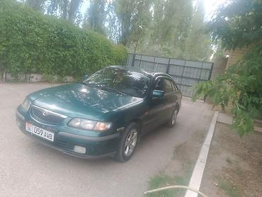 a8 d2: Mazda 626: 1997 г., 2 л, Механика, Бензин, Седан — 1