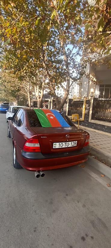 avtomobil ucun aksesuarlar: Opel Vectra sedan - Kuzov: 4 qapılı sedan, tünd qırmızı rəng - — 4