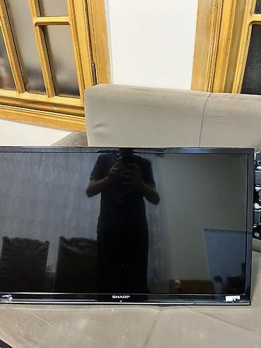 Televizorlar: Sharp LED televizor Xüsusiyyətlər: - Ekran: təxminən 32–40 düym — 2