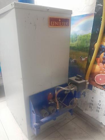 моторчик на печку: Газовый отопительный котел UNILUX КГВ-12 - Тип: напольный газовый — 1