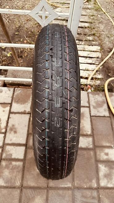 купить докатку r18: 18×4T, 5×114.3, DIA 66 мм, ET около +25, а сама шина — T165/90D18 — 2