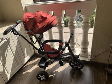 Red kids’ 3-wheel bike & stroller in very good condition. Price