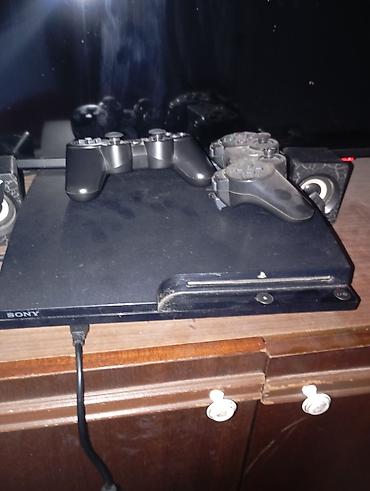 sony playstation 3: Игровая консоль Sony PlayStation 3 (Super Slim) с двумя беспроводными — 2