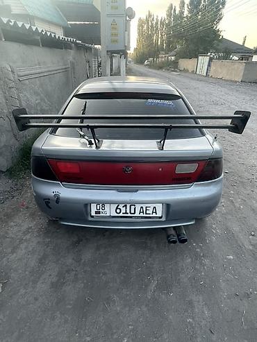 Унаа сатуу: Mazda Lantis: 1996 г., 1.6 л, Кол менен иштөөчү, Бензин, Седан — 6