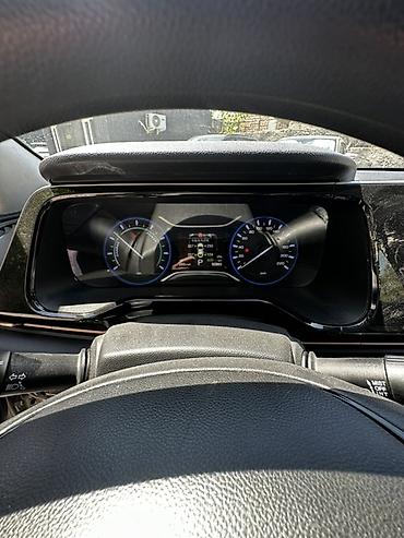 aion a60: GAC Aion S — электрический седан серо‑серебристого цвета. Основные — 7
