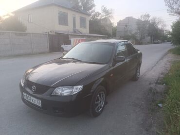 опель вектра с: Mazda 323: 2002 г., 1.6 л, Автоматические, Газ, Седан