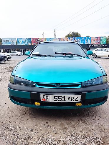 Mazda 626: 1995 г., 1.8 л, Механика, Седан