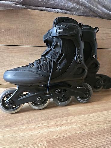 Roliklər: Inline skeytlər (roller skates) – 4 təkərli, qara rəng. - Ölçü: 38 — 5