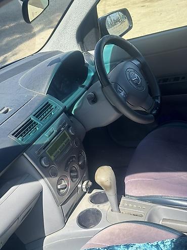 мисубиси спейс стар: Mazda Demio: 2002 г., Автомат, Бензин, Хэтчбэк — 6