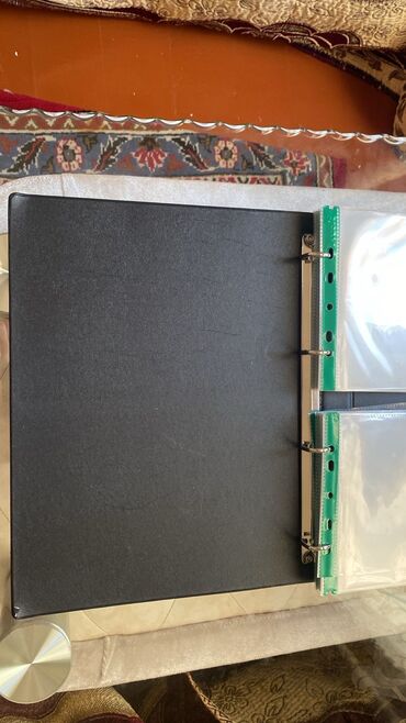 Qovluqlar və fayllar: Albom 71 ədə list və 76 ədəd milli, rus və xarici əskinaslar. Qiymət — 1