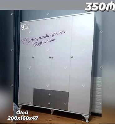 paltar şkafı qiyməti: Ağ rəngli 4 qapılı geyim dolabı. Orta hissədə iki ədəd tutacaqlı qapı — 1