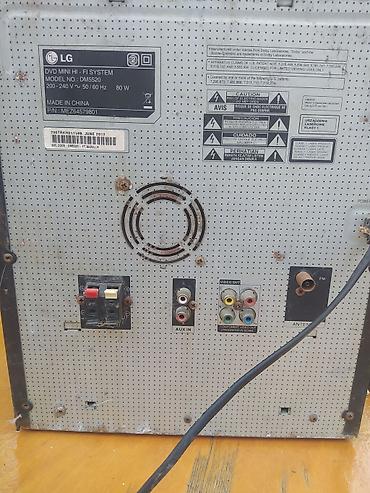 disk dvd: LG DM5520 DVD Mini Hi‑Fi System - Model: DM5520 (etiketdə göstərilən) — 3