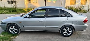 чехол на мопед: Mazda 626: 2000 г., 2 л, Механика, Бензин, Хэтчбэк — 3