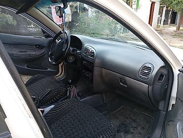 Daewoo: Daewoo Nubira sedan - Kuzov: 4 qapılı sedan, ağ rəng - Ban dizaynı — 17