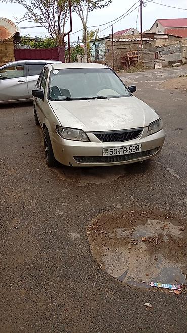 car aksesuar: Mazda 6: 2 l | 2002 il Sedan — 2