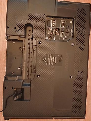 gencede televizor: Sharp AQUOS LCD televizor Xüsusiyyətlər: - Ekran: təxminən 32" — 2