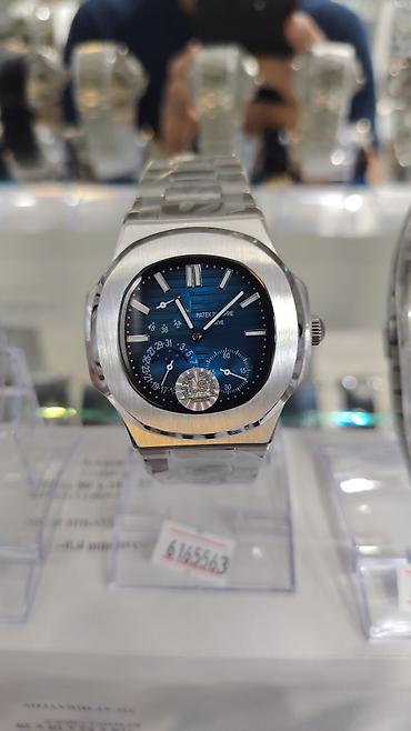 casio saat: Patek Philippe Nautilus stili kişi qol saatları – çoxfunksiyalı, zərif — 2