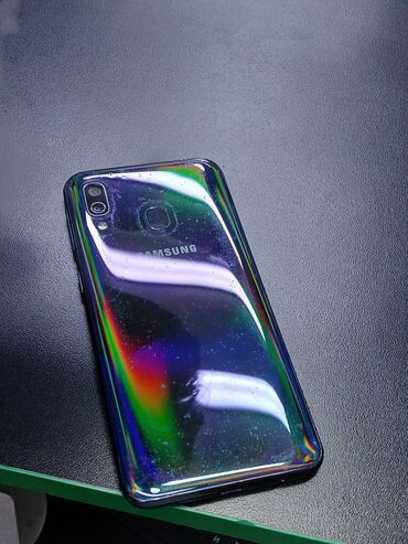 тела: Samsung Galaxy A40, Б/у, 64 ГБ, цвет - Фиолетовый, 2 SIM