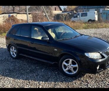 Mazda: Mazda 323: 2001 г., 2 л, Механика, Бензин, Хэтчбэк