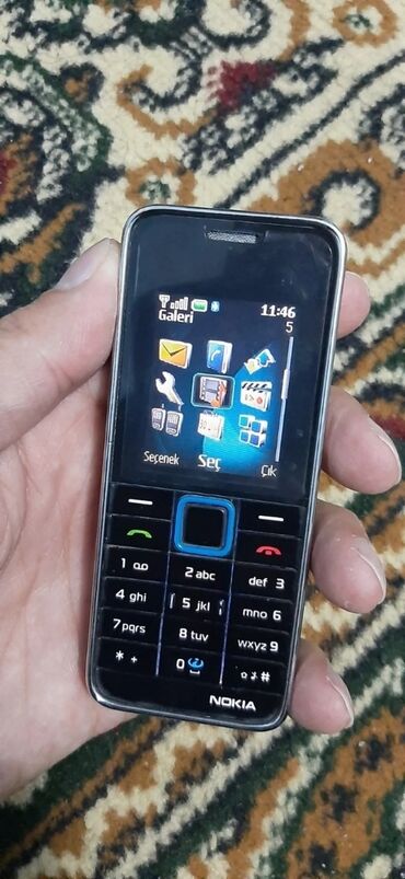 телефон fly 7: Nokia 5235 Comes With Music, 2 GB, rəng - Qara, Düyməli