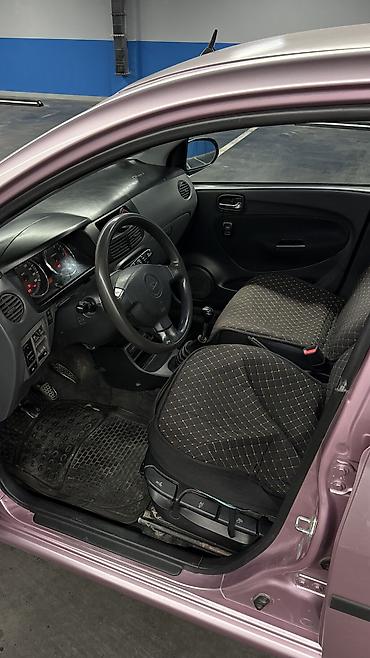 дейхатсу куоре: Daihatsu Cuore: 2004 г., 1 л, Механика, Бензин, Хэтчбэк — 9